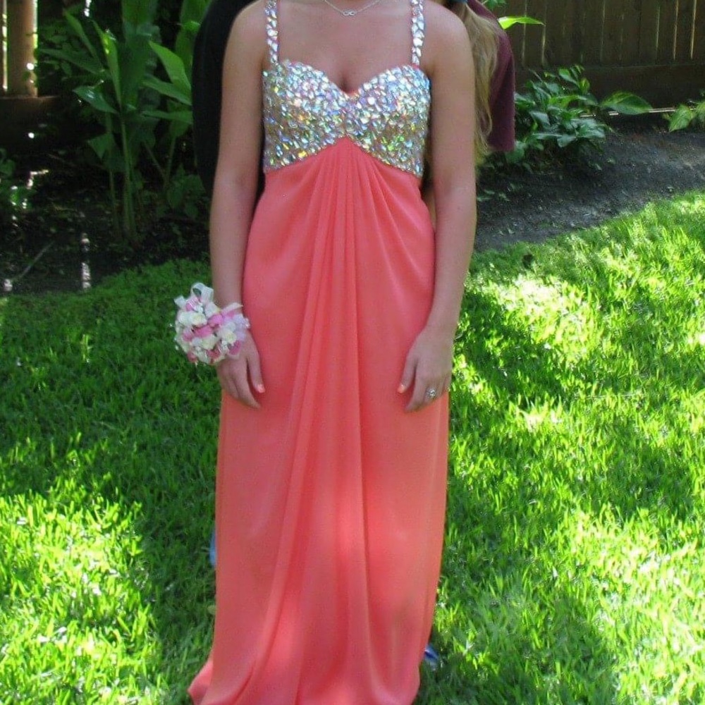 Peach jeweled prom dress